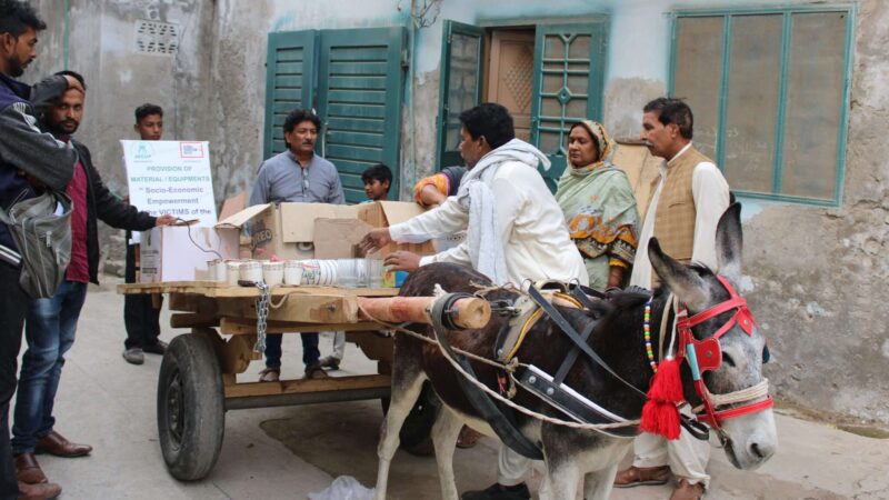 An image of Javed with his new donkey-pulled cart.
