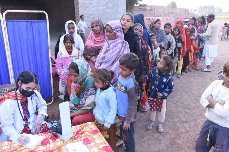 Impoverished Christians in Pakistan, including numerous children, wait to have their vitals checked. Many suffer from respiratory ailments due to chronic exposure to dust, smoke, chemicals and air pollution.
